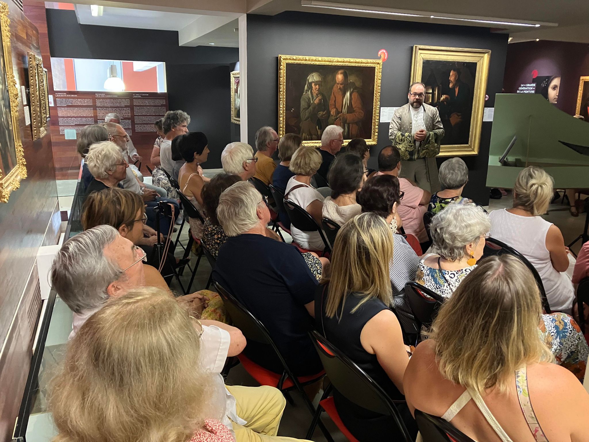 Personnes participants à un concert baroque au musée Georges de La Tour